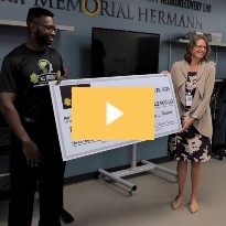 Former traumatic brain injury patient, Kel Matabah, returned to TIRR Memorial Hermann to donate $22,500 in therapy scholarships for patients.