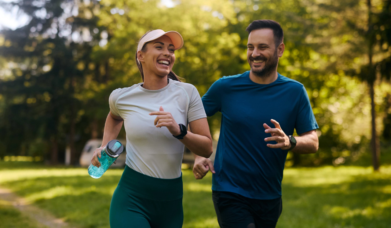 Man and woman jogging outside