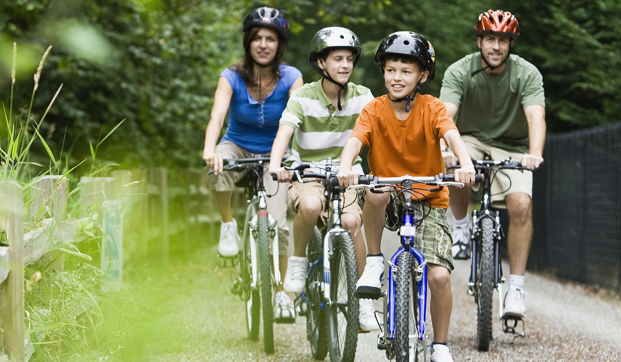 Family biking on a trail