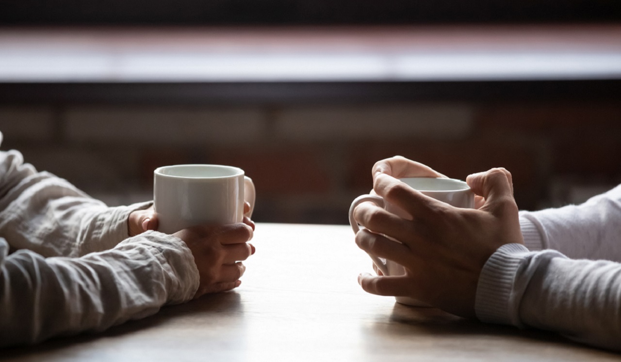 Two people having coffee