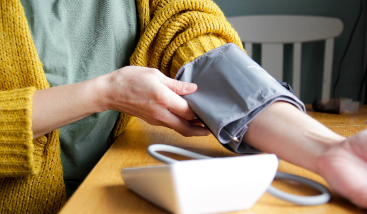 Person checking their blood pressure