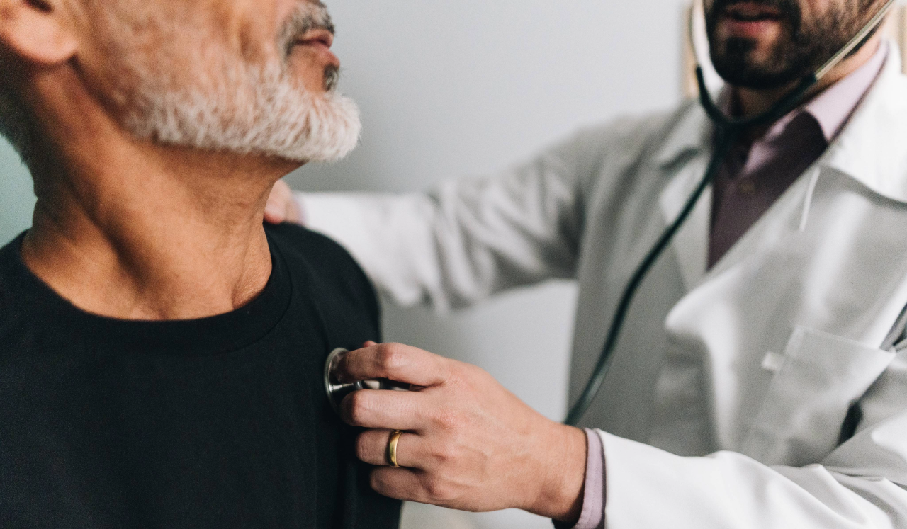 Man at heart check up with doctor