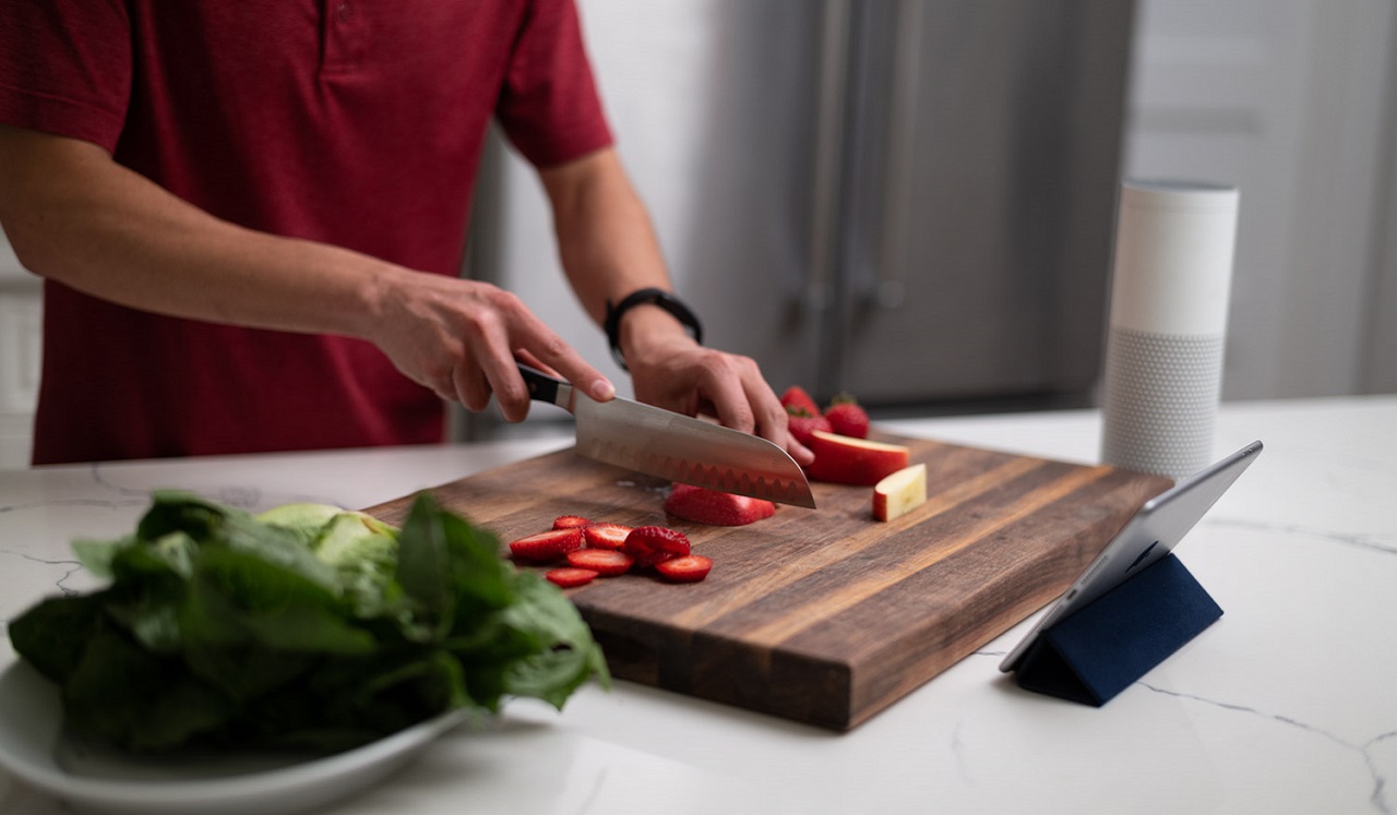 Woman cutting healthy food