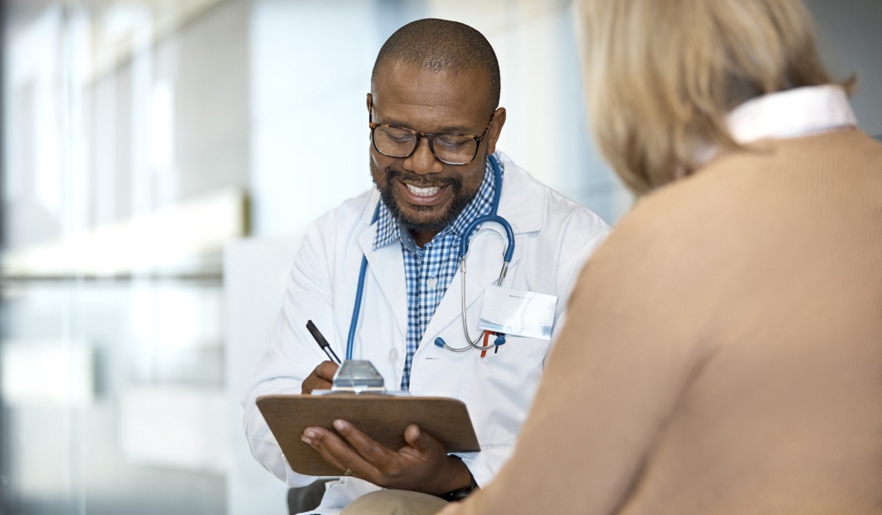 Doctor consulting with patient