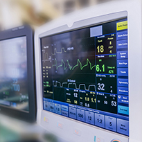 Medical monitors in a hospital setting.