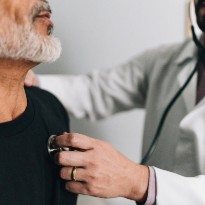 Man at heart check up with doctor