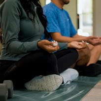 Two people meditating