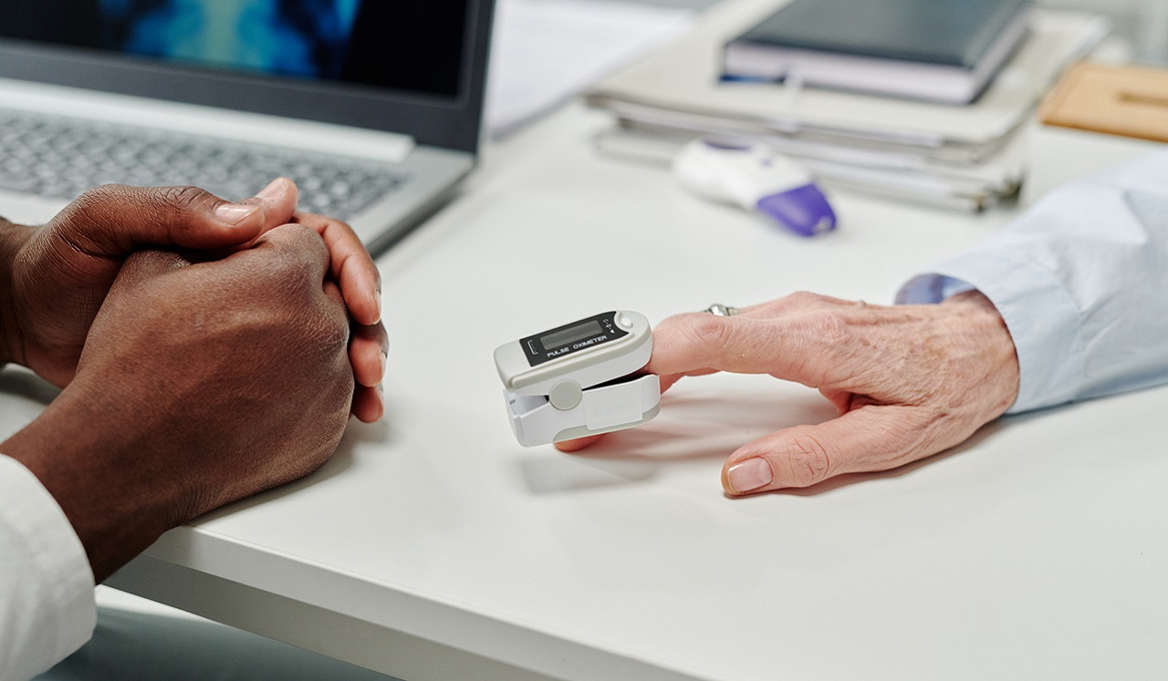 Person checking their blood pressure