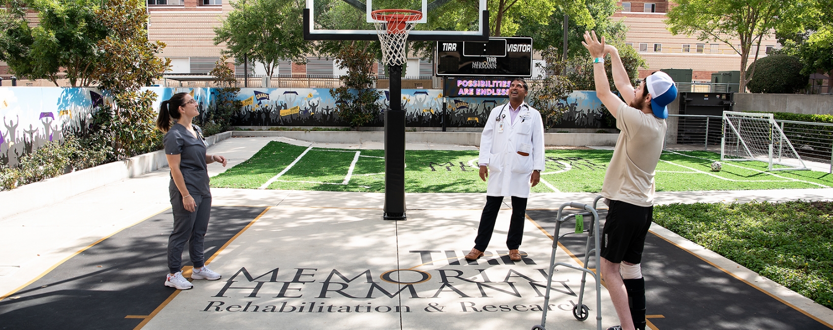 TIRR patient playing basketball