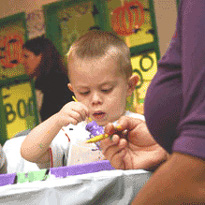 Child painting a mural