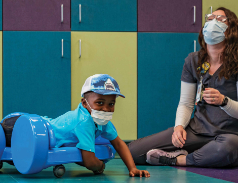 Pediatric patient, Major Hudlin, has some fun in therapy.