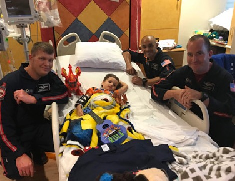 Trauma survivor Grayson Guice and the team of paramedics