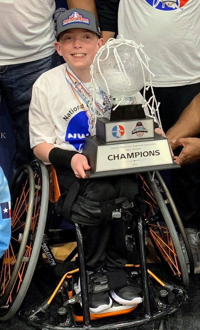 patient finley holding trophy