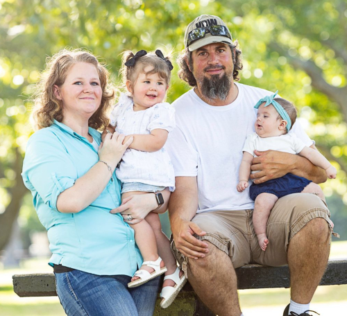 NewStart patient, Cherie Evans, poses with her family.