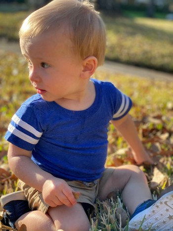 Andrew outside smiling