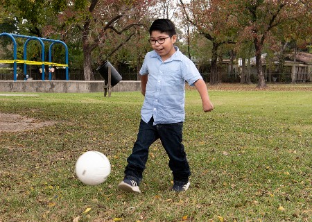 David playing soccer