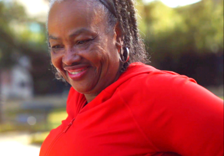 Linda Norah-Davis smiles on while on the TIRR Memorial Hermann campus.