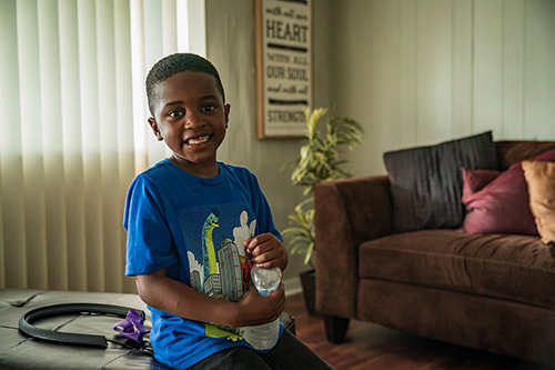 Young stroke patient, Major Hudlin, poses for a photo.