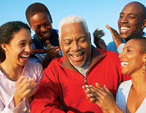 A family of children and adults celebrate being together.