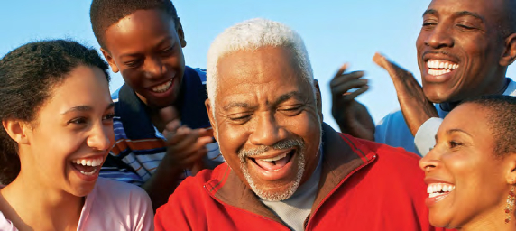 A family of children and adults celebrate being together.