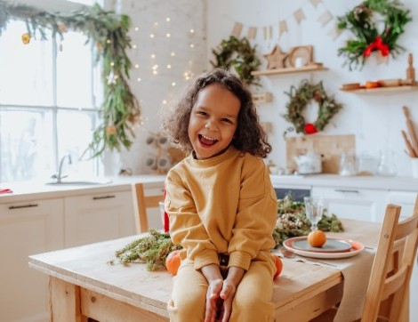 child at holiday table