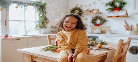 child at holiday table