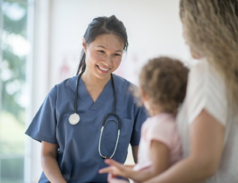 patient with parent and doctor