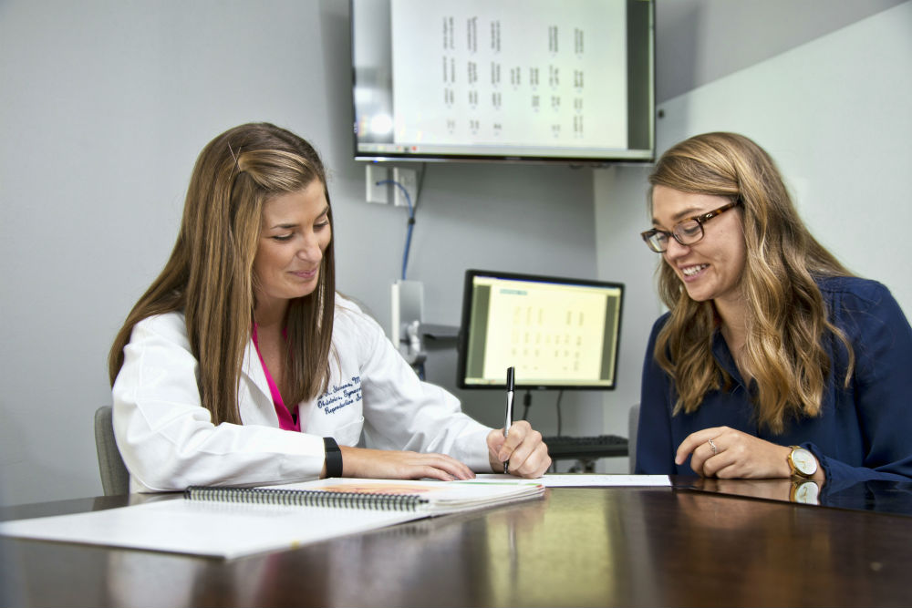 Signing papers with patient