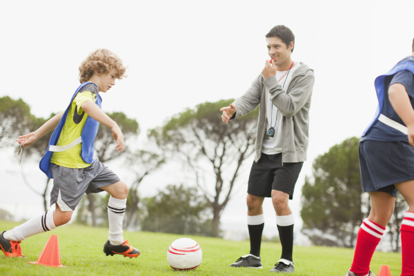 Kid playing soccer