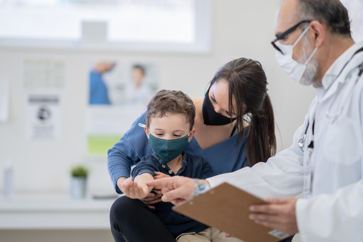 photo of a Child, Mother, and Doctor