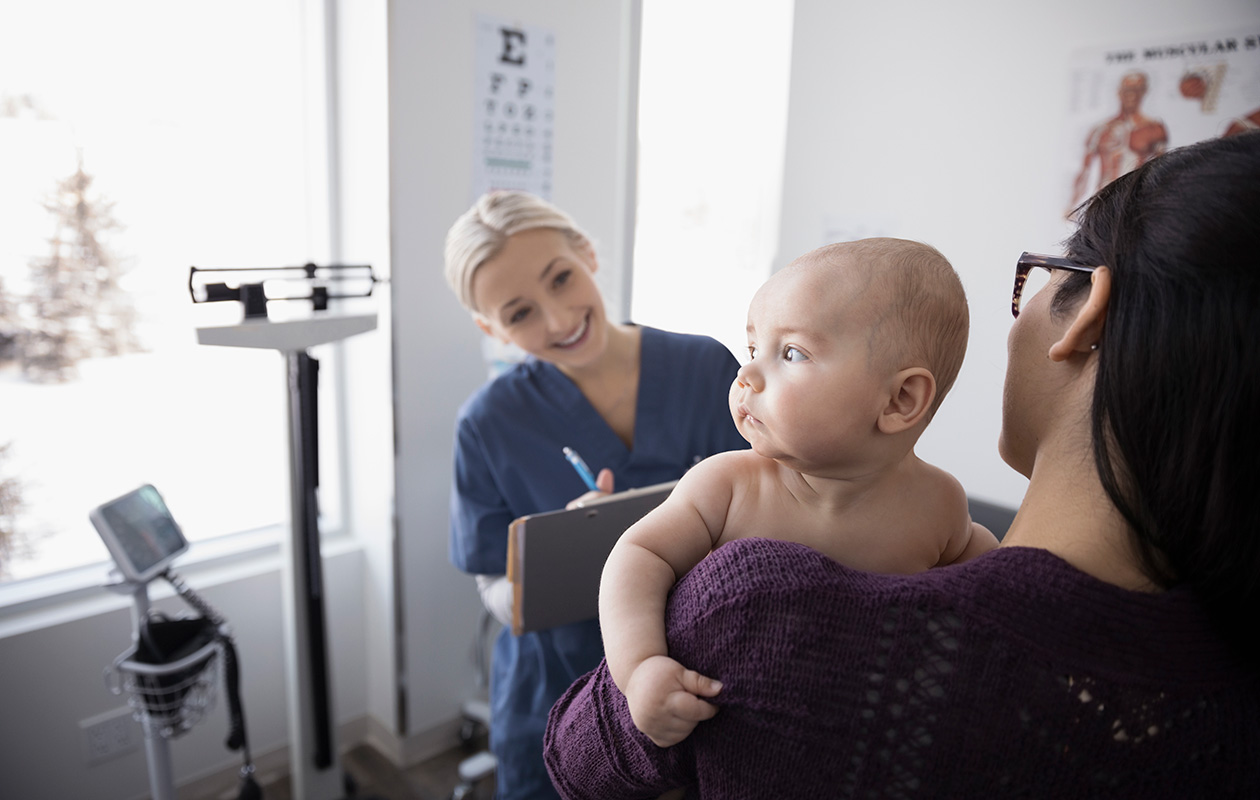 Nurse checking up on child