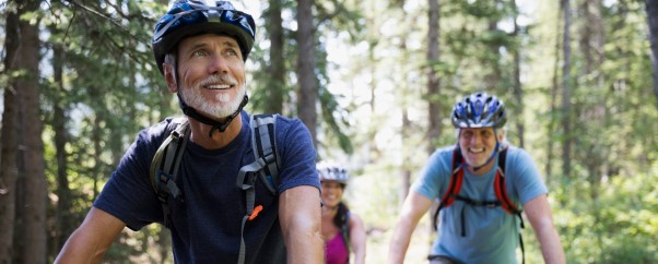 Older couple biking