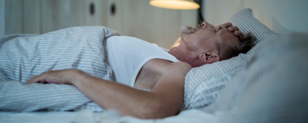 Man having trouble sleeping