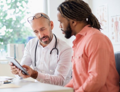 doctor talking to patient