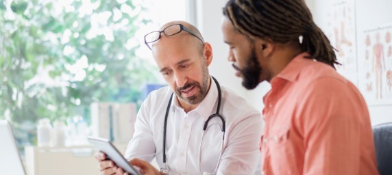 doctor talking to patient