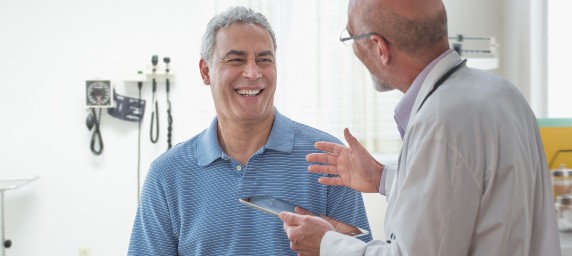 Doctor consulting with patient