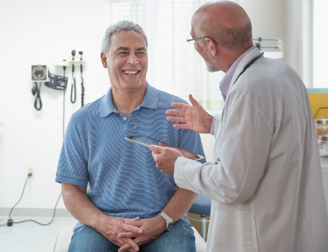 Doctor consulting with patient