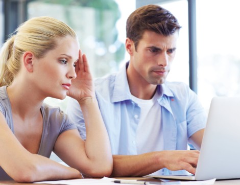 Man and woman at computer screen