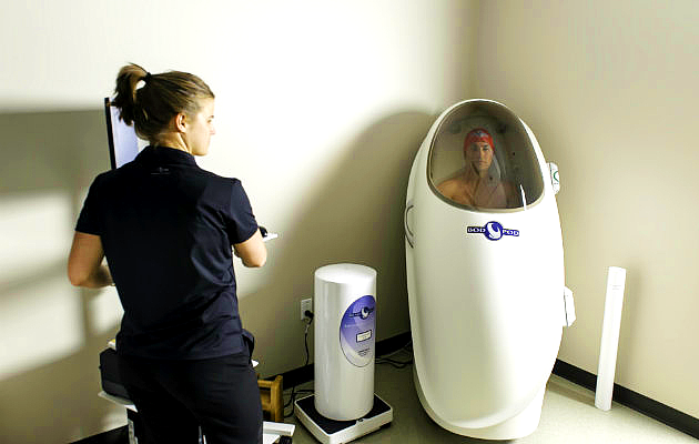 BOD POD technician oversees testing