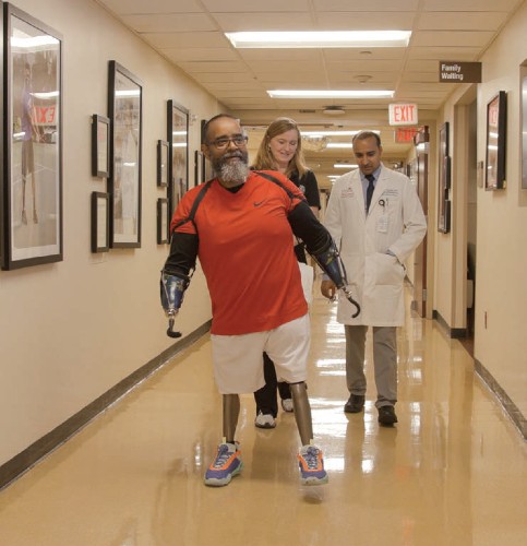 TIRR Memorial Hermann patient, Wayne Moorehead, walks without assistance with prosthetics.