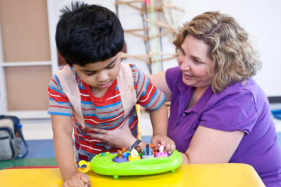 Child doing rehab with therapist