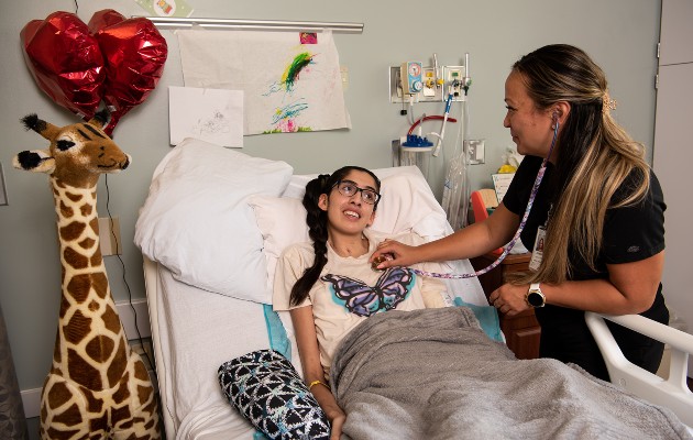 A TIRR Memorial Hermann patient gets a check up from staff