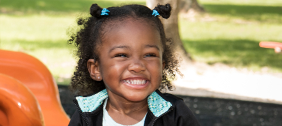 TIRR Memorial Hermann pediatric patient, Joleigh Babineaux, smiling.