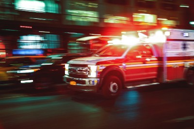 Ambulance driving through city