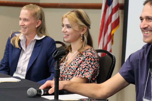 Trauma survivor Emilia speaks at the Red Duke Trauma Symposium.