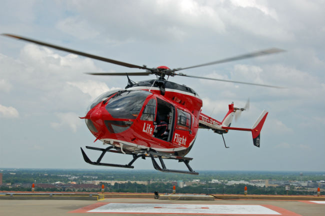 Life Flight helicopter landing on helipad